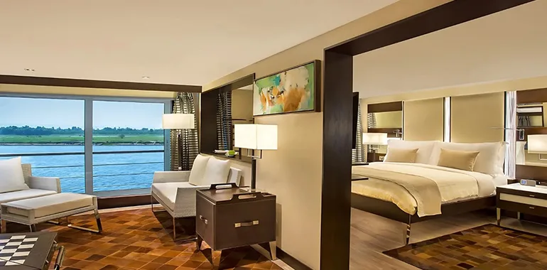 Luxurious Suite With A Large Window Offering A Nile View