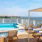 The pool and sun deck of the Nile Cruise ship, providing relaxation during your 8 Day Egypt Itinerary with Hurghada.