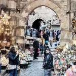 An enchanting display of glowing brass lanterns at a bustling market during a professional Egyptian Museum Cairo tour
