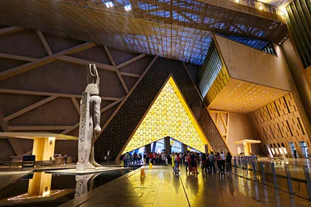 The towering statue of Ramses II welcomes guests on a Private tour of the Grand Egyptian Museum
