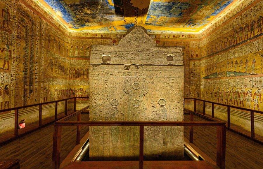 Rameses IV burial chamber sarcophagus painted with scenes from the Book of the Gates and the Amduat Valley of the Kings Egypt, with vibrant wall and ceiling paintings surrounding it, a highlight for cairo luxor sharm el sheikh tours.