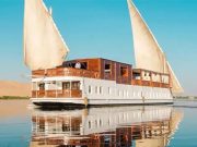 A traditional Egyptian Dahabiya sailing boat on the Nile riverThe Royal Cleopatra Dahabiya cruise ship on the Nile River, Egypt.