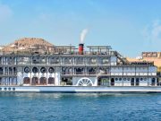 The classic Mövenpick SS Misr Steamer Nile Cruise sailing past desert landscapes.