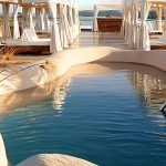 A luxurious Arabian-themed sundeck with a mosaic-tiled plunge pool on the Sanctuary Zein Nile Chateau dahabiya.