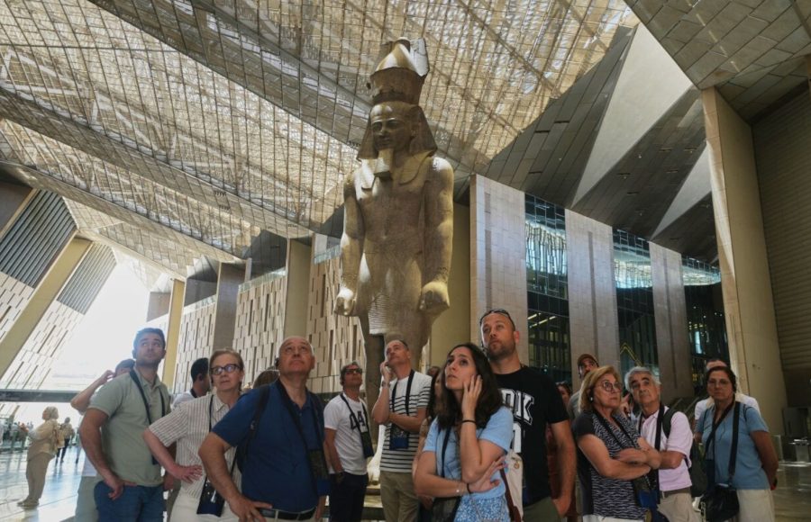 A traveler capturing the modern facade of the building on a short trip to Grand Egyptian Museum