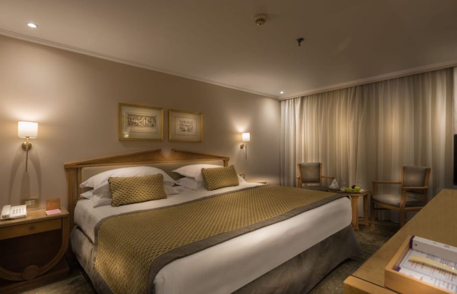 A king-sized bedroom on the Steigenberger Regency.