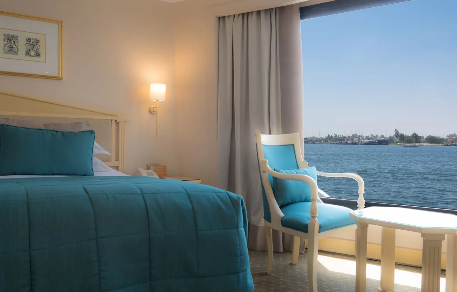 The bedroom area of a suite on the Steigenberger Regency Nile Cruise.