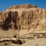 The vast, terraced architecture of the Temple of Hatshepsut against the cliff face at Deir el-Bahari, a dramatic, rock-cut stop on an egypt highlights in 6 days tour.