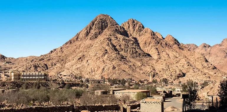 Panoramic View Of The Rugged, Reddish-Brown Mountains Of The Sinai Desert, Located In The Eastern Desert, Egypt.