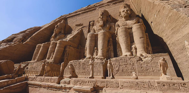 The Main View Of An Entrance To The Great Temple Of Abu Simbel With Ancient Colossal Statues Of Ramesses Ii