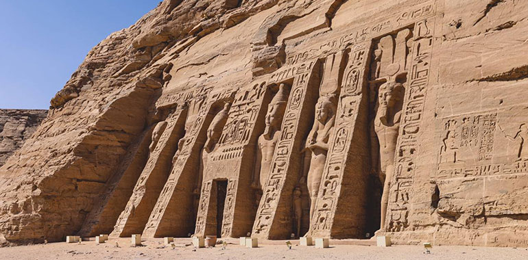 The Main View Of An Entrance To The Small Temple At Abu Simbel With Ancient Colossal Statues Of Ramesses Ii