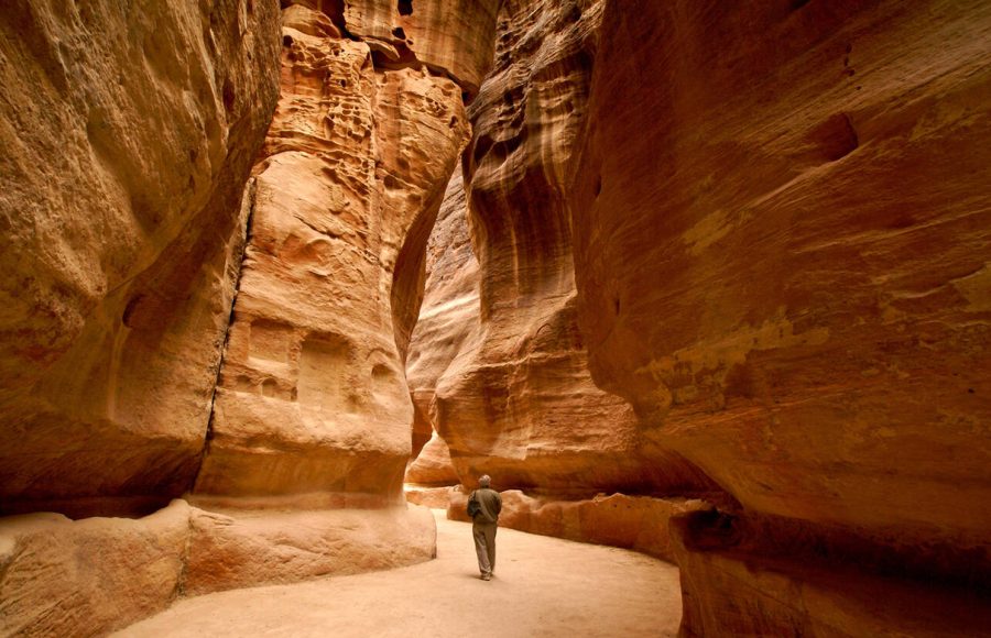 Tourist-walking-through-the-Siq-Petra-Jordan
