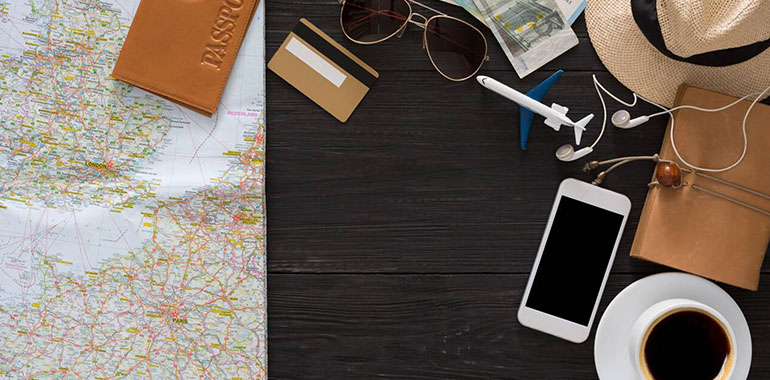 Travel Planning Includes A Map Passport Money Phone And Coffee On Atable