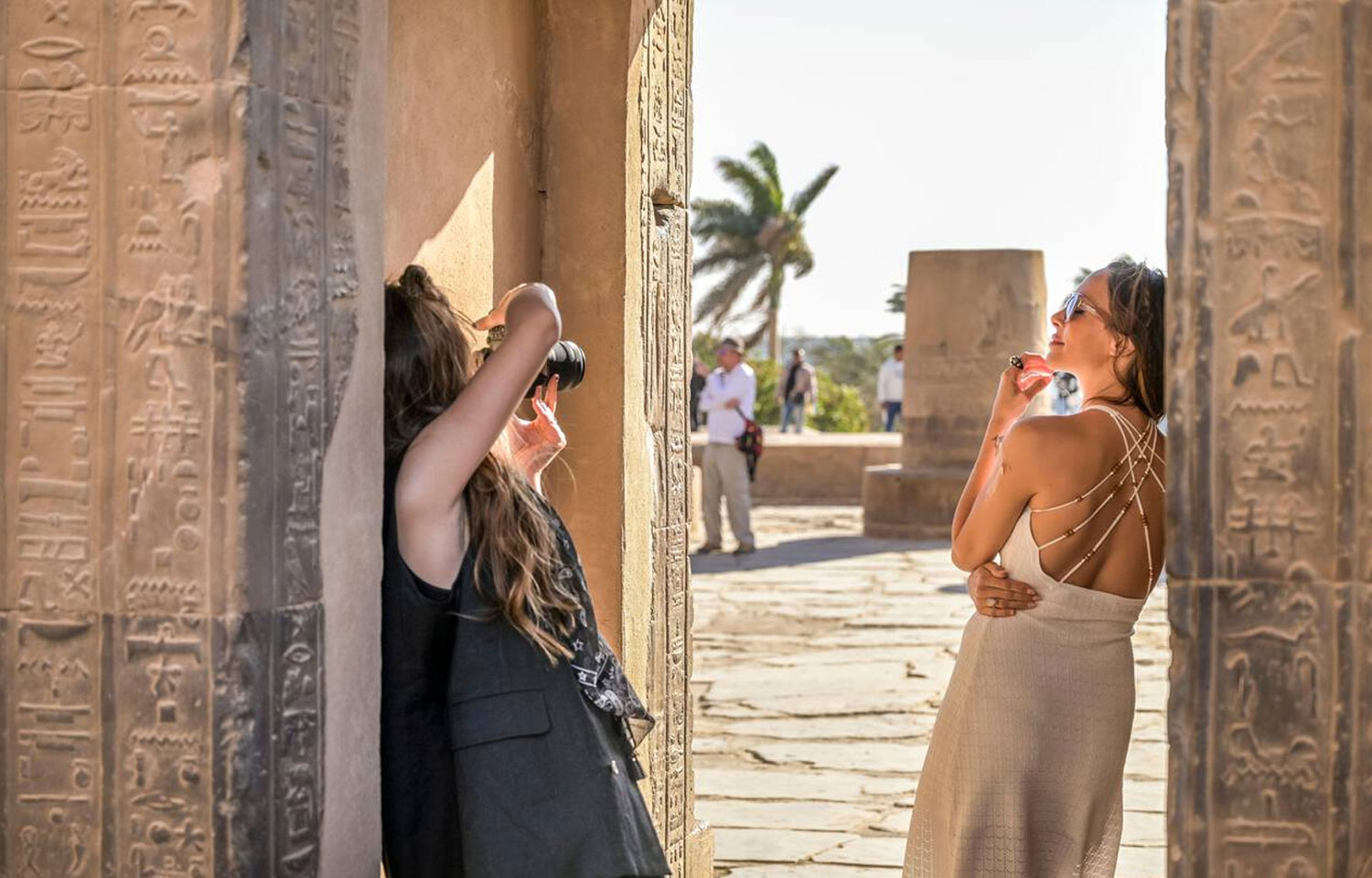 Two Traveller Taking Photos At Kom Ombo Temple