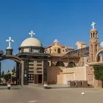 The impressive entrance gates of a monastery complex during a Wadi El Natrun monasteries tour