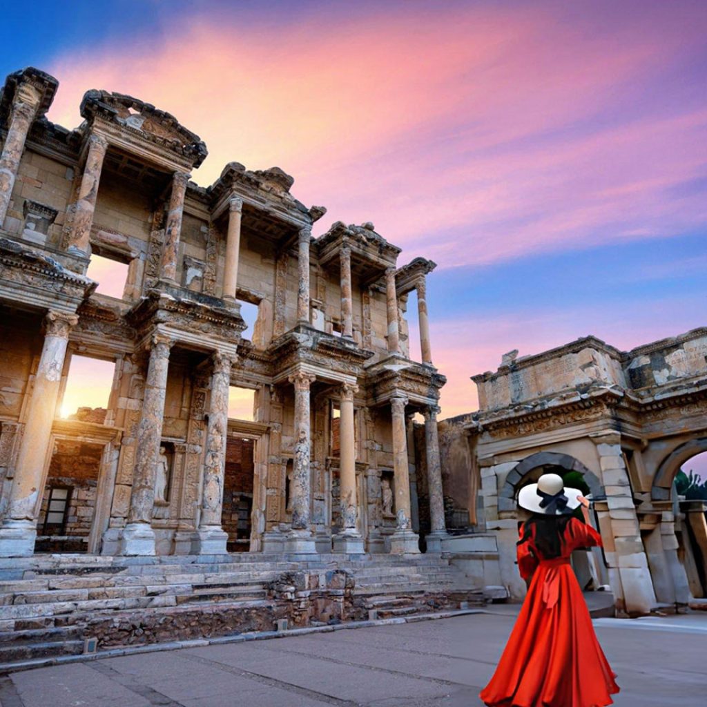 Woman standing in Celsus Library at Ephesus ancient city in Izmir Turkey 1