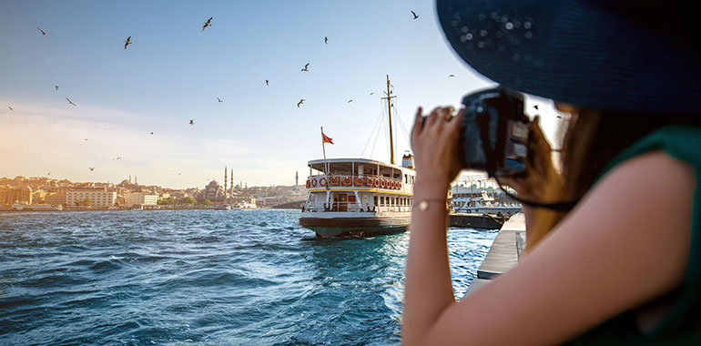Woman traveler on the Bosphorus in Istanbul