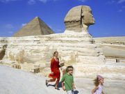 A family at the Pyramids, a highlight of any 7 day Nile Cruise Itinerary.