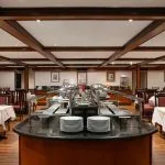 Formal dining room and buffet area on the Commodore Nile Cruise ship.