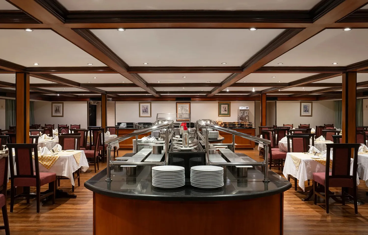 Formal dining room and buffet area on the Commodore Nile Cruise ship.