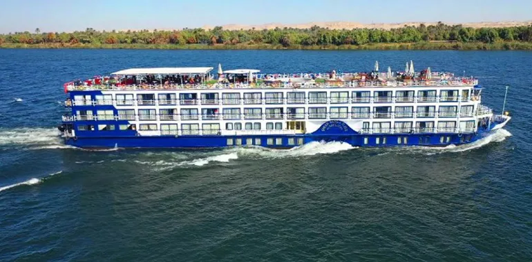 Multi-Deck Nile Cruise Ship At Speed On The River
