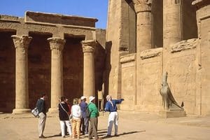 The grand Temple of Edfu with its distinctive twin design, standing on the banks of the Nile, is a prominent feature on Egypt archaeology tours and Egypt Archeological Tours & Culture Trips.