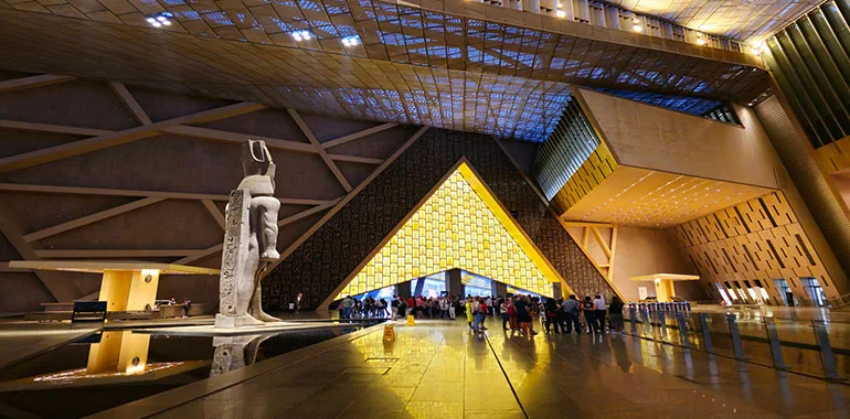 Tourists Inside The Modern Grand Egyptian Museum, A Must-See On Short Egypt Tours And Travel Itinerary Ideas