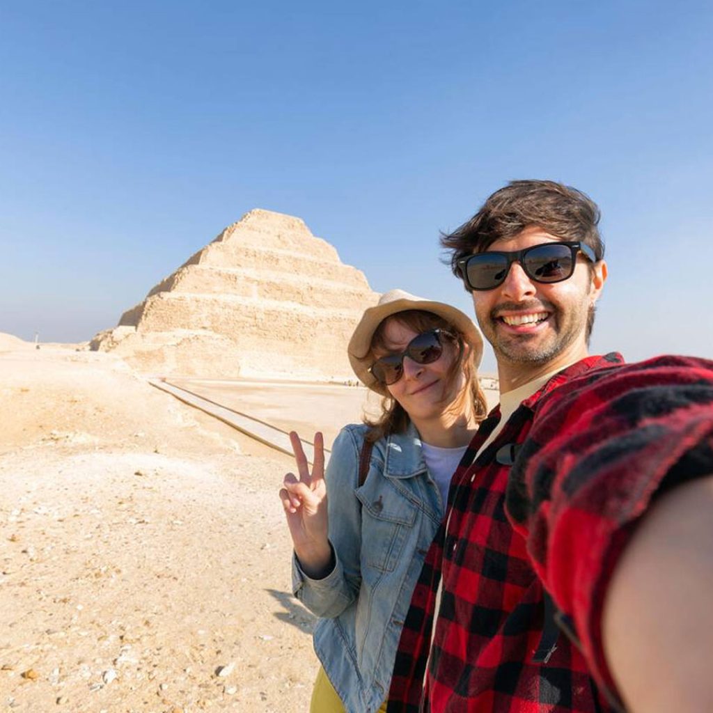 Happy Tourist Couple Taking A Selfie At Saqqara Step Pyramid