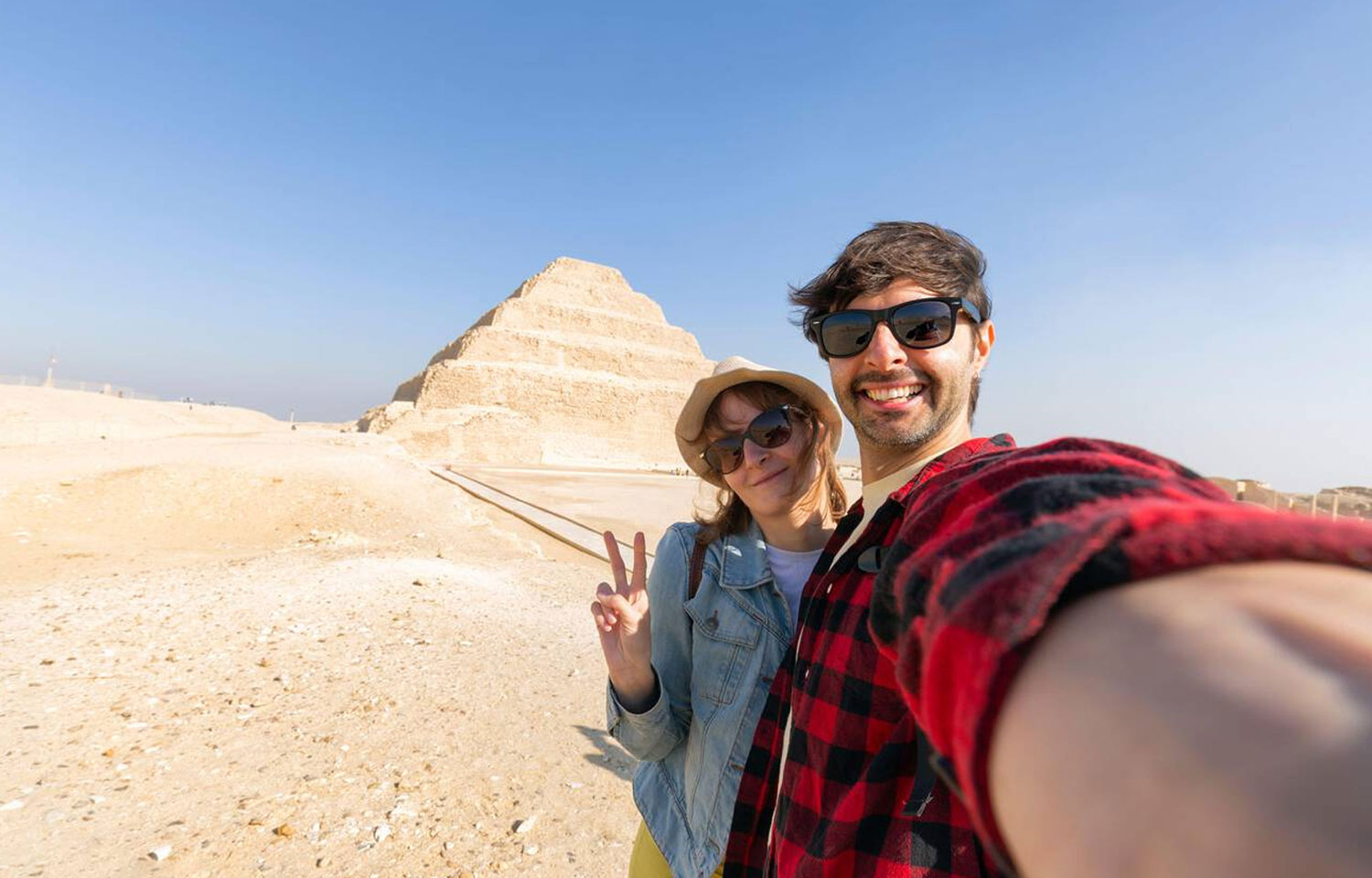 Happy Tourist Couple Taking A Selfie At Saqqara Step Pyramid