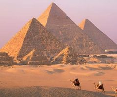 Holiday Packages to Egypt From Kuwait Feature The Giza Pyramids Embark on captivating Egypt Tour Packages from Kuwait, experiencing a memorable camel ride before the majestic Giza Pyramids.