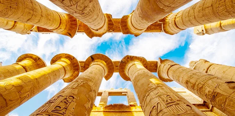 Looking Up At The Massive, Detailed Columns Of Karnak Temple.