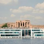 5 star ship with the ancient Kom Ombo Temple, highlighting a key sight on your best Nile Cruise and Hurghada holiday.