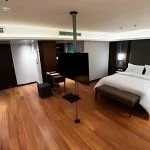 A modern cabin with a king-size bed on the cruise ship, included in the Best Luxor and Aswan Nile cruise from Cairo.