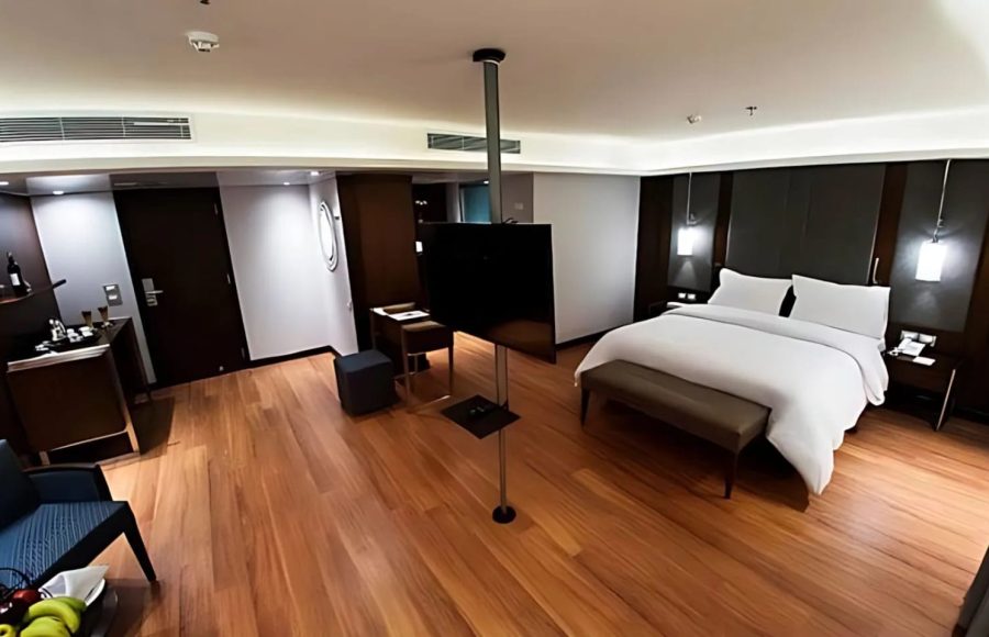 A modern cabin with a king-size bed on the cruise ship, included in the Best Luxor and Aswan Nile cruise from Cairo.