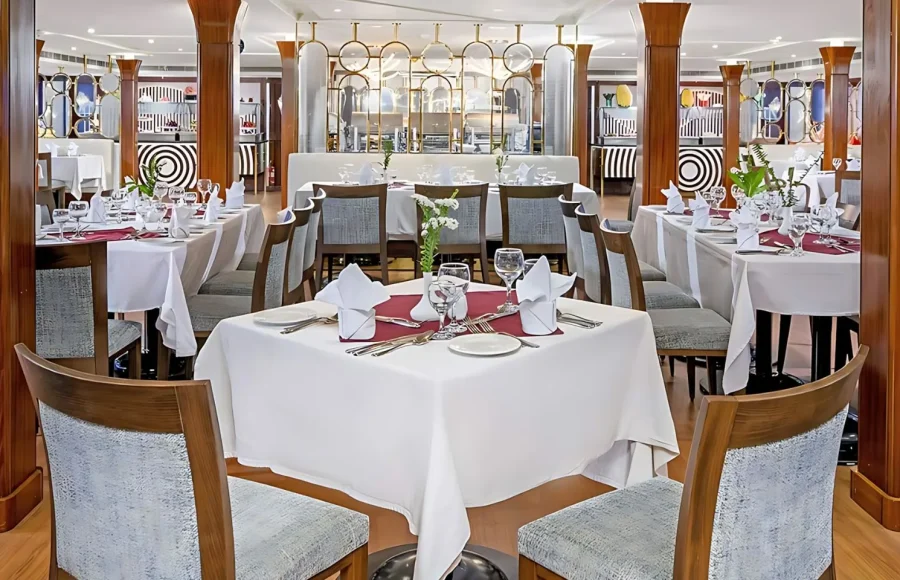 An elegant dining room on a Nile cruise ship, offering fine dining throughout the 7 day Nile Cruise Itinerary.