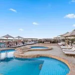 Nile cruise sundeck with swimming pool and loungers.