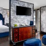 Elegant cabin interior on the SS Misr Nile Cruise with luxurious furnishings.