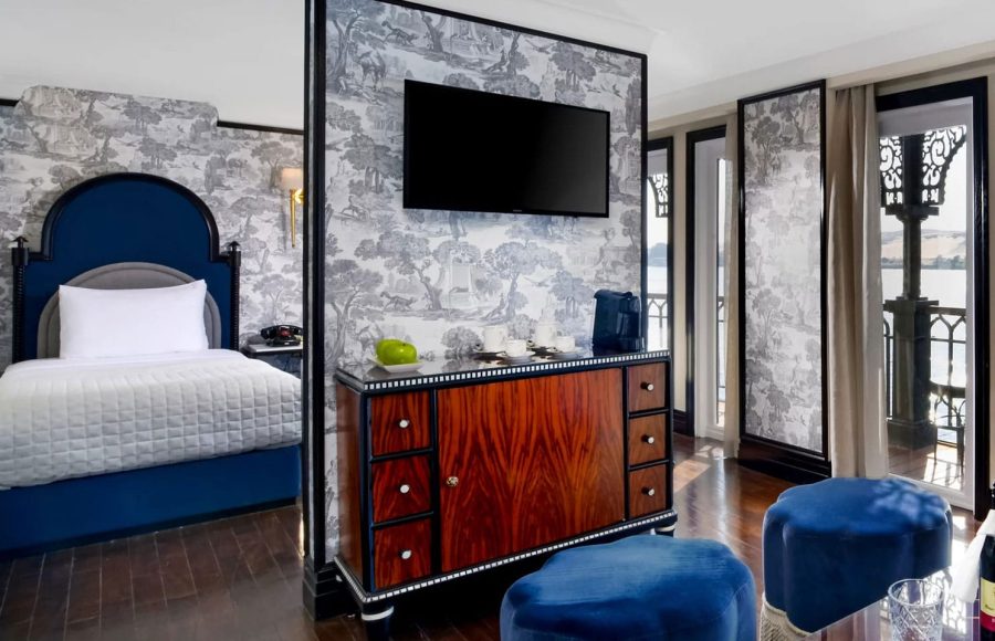 Elegant cabin interior on the SS Misr Nile Cruise with luxurious furnishings.