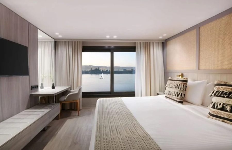 A luxurious suite on the MS Terramar with a panoramic Nile view.