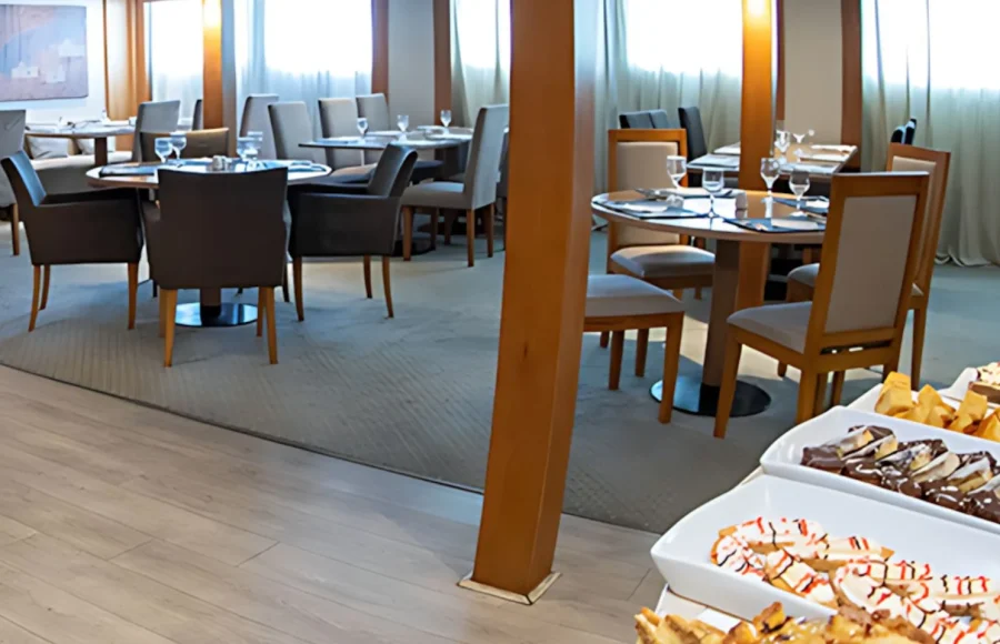 A cruise ship dining room, highlighting the comforts of a 7 day Cairo Alexandria tour with Nile cruise.