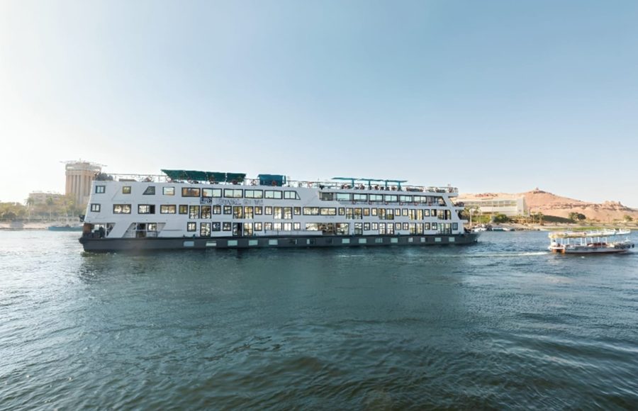 A cruise ship sailing down the Nile River, a highlight of the Cairo and Nile Cruise 7 days trip.