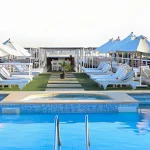 A swimming pool, loungers, and a small jacuzzi on the top deck—perfect for relaxing during your 7 day Cairo Alexandria tour with Nile cruise.