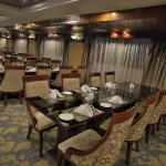 The dining room of a Nile cruise ship, providing a sophisticated meal on your Best Egypt Nile Tour 10 Days.