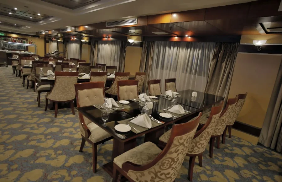 The dining room of a Nile cruise ship, providing a sophisticated meal on your Best Egypt Nile Tour 10 Days.