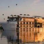 The Soleil Cruise Ship on the Nile with hot air balloons.