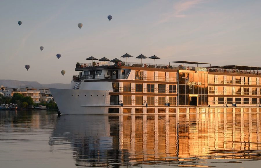 The Soleil Cruise Ship on the Nile with hot air balloons.
