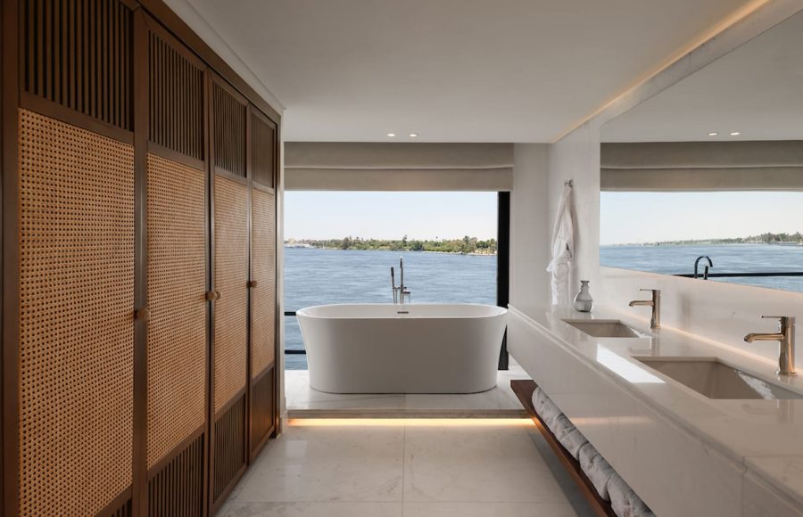 Modern and luxurious bathroom on the MS Soleil Nile Cruise, featuring a freestanding bathtub.