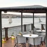 Outdoor seating on the upper deck of the Mövenpick SS Misr Steamer Nile Cruise.