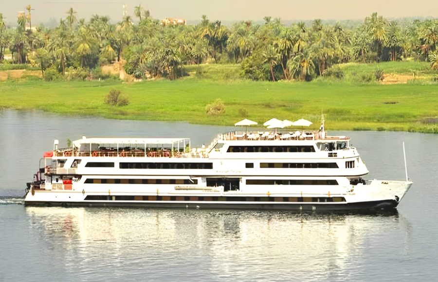A luxury Nile cruise ship, the MS Alexander The Great, sailing on the river.