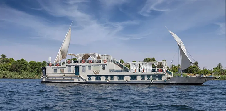 Ultra-Luxury Dahabiya Sailboat With White Canopy And Sails.
